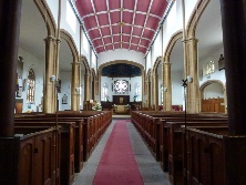 The aisle and altar in St Andrew's Church. 