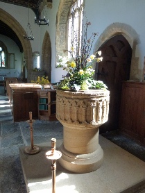 The font in All Saints Church in West Camel
