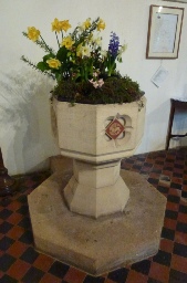 The font in Chipstable Church.